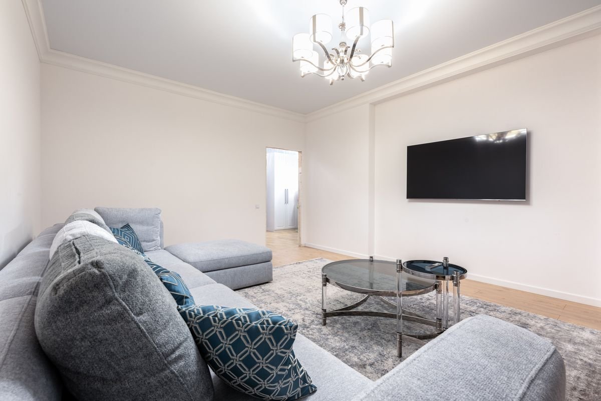 Wall-mounted TV in living room